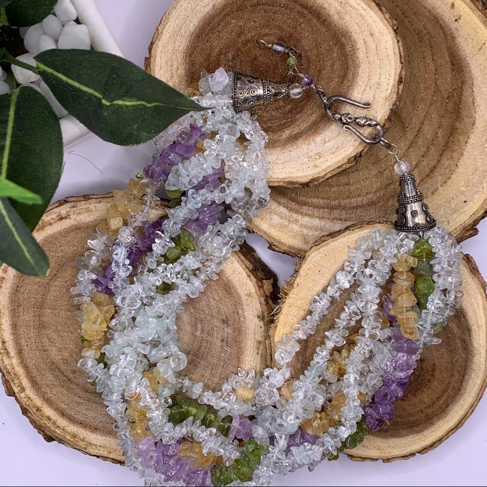 Natural multi-strand white crystal necklace.  White, green, gold and purple high